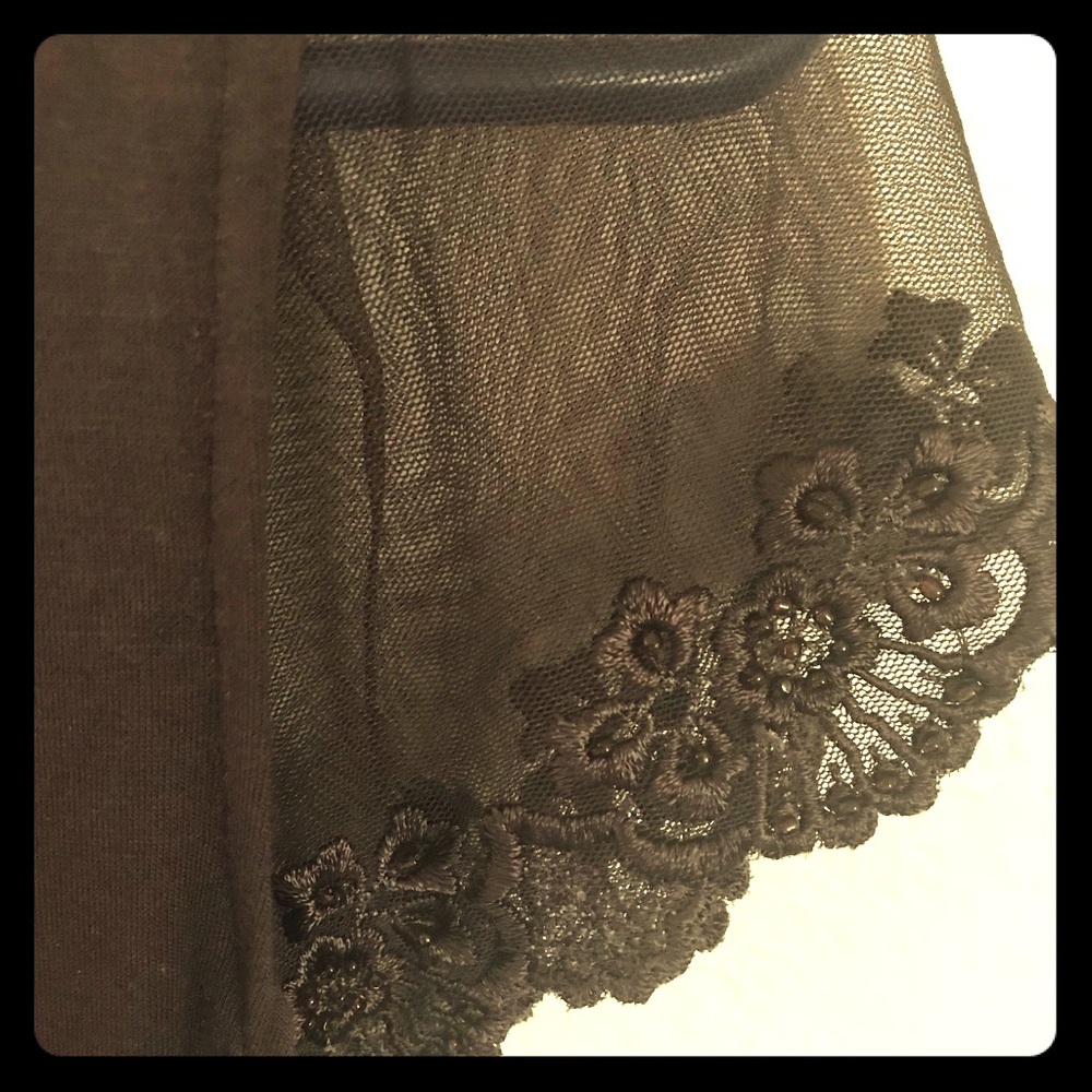 Sleeved top with lace and beaded details